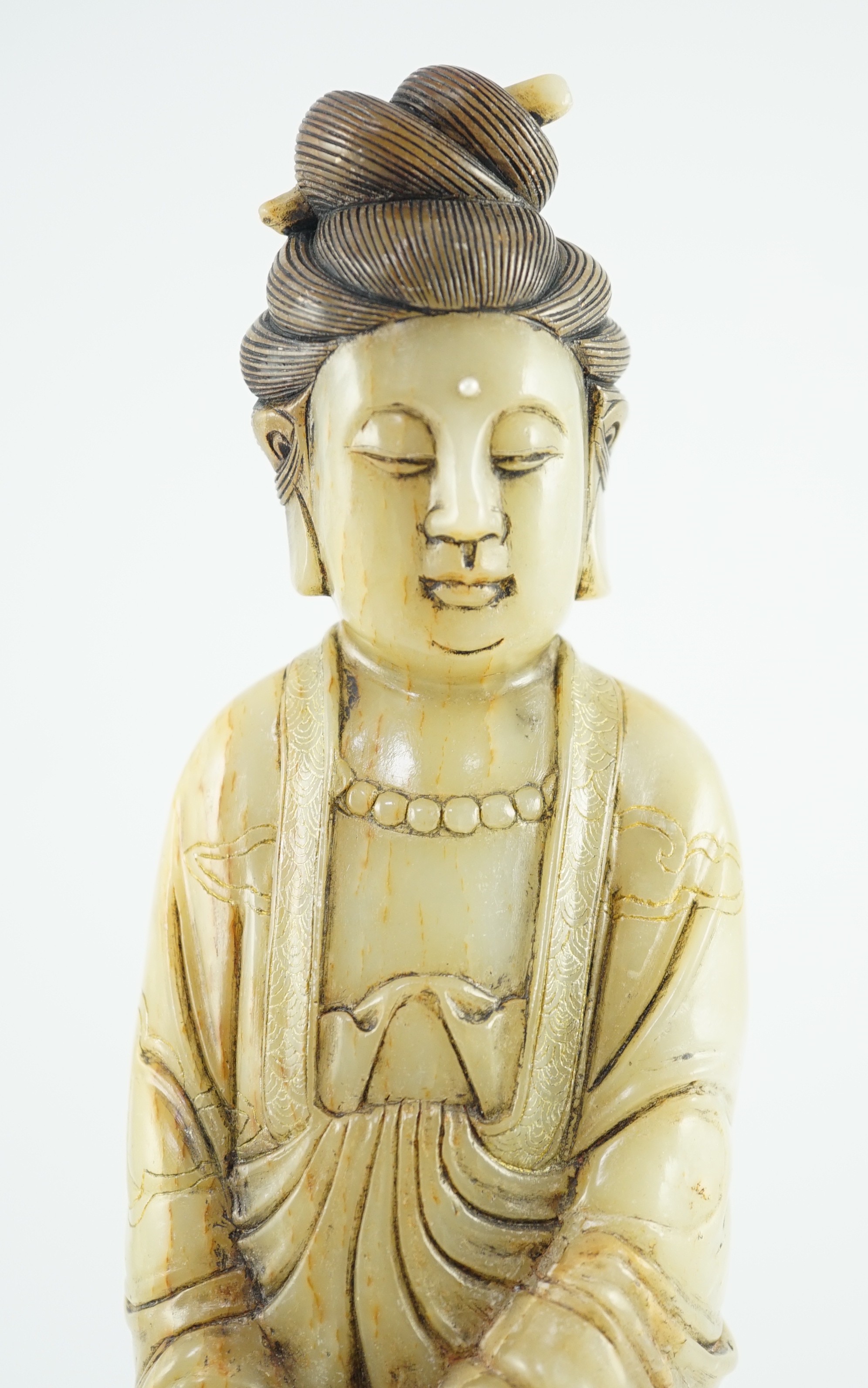 A Chinese soapstone standing figure of Guanyin, 19th century, 38cm high